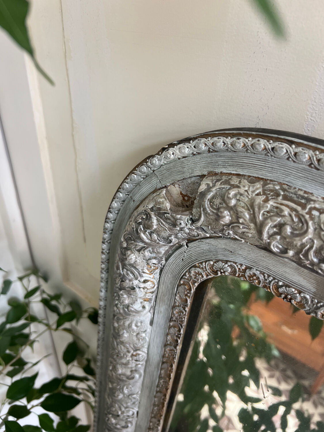 Antique mirror in stucco and wood