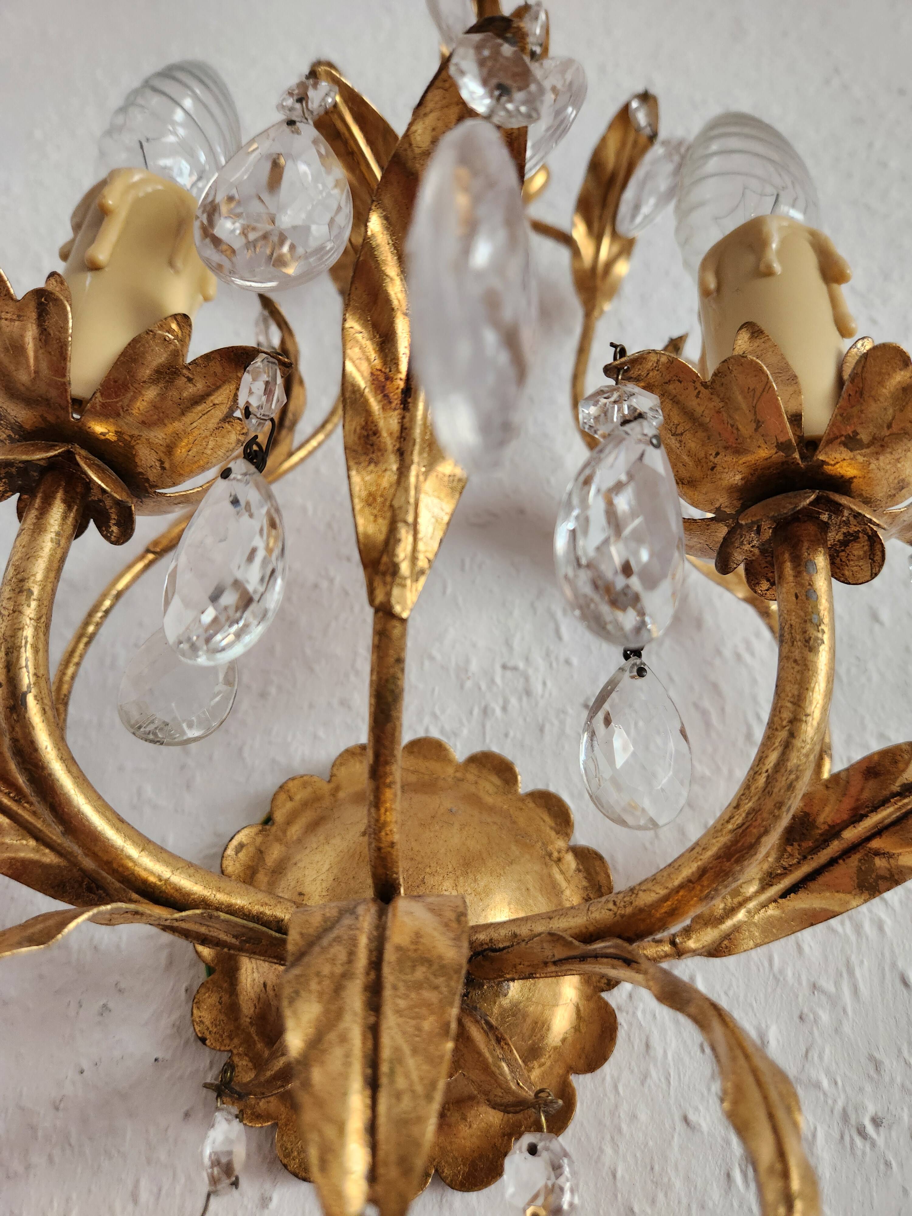 Hand-forged wall lamp gilded with gold leaf and crystals, Italy