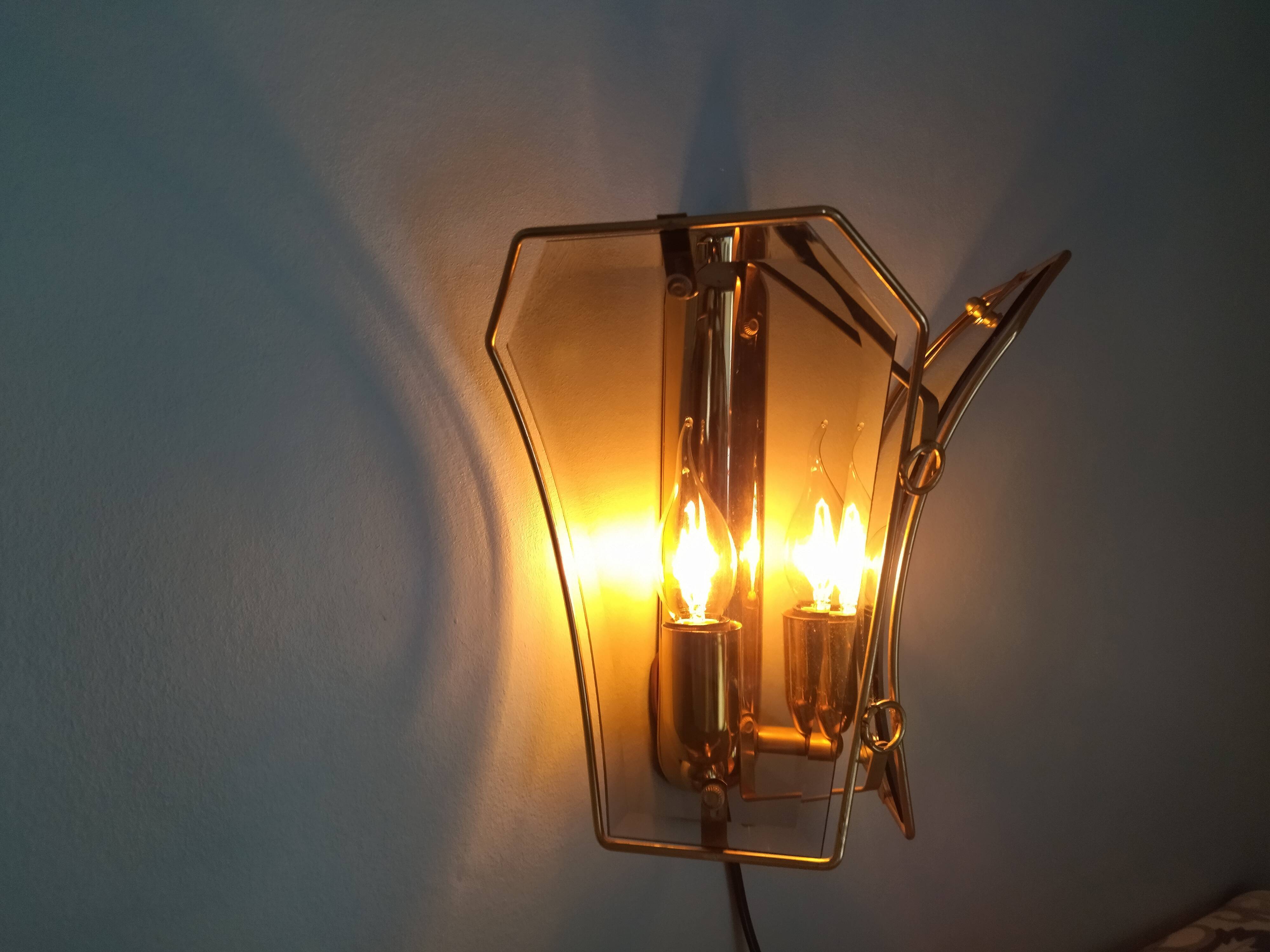 Wall lamp two fires in brass and curved glass from the 80s