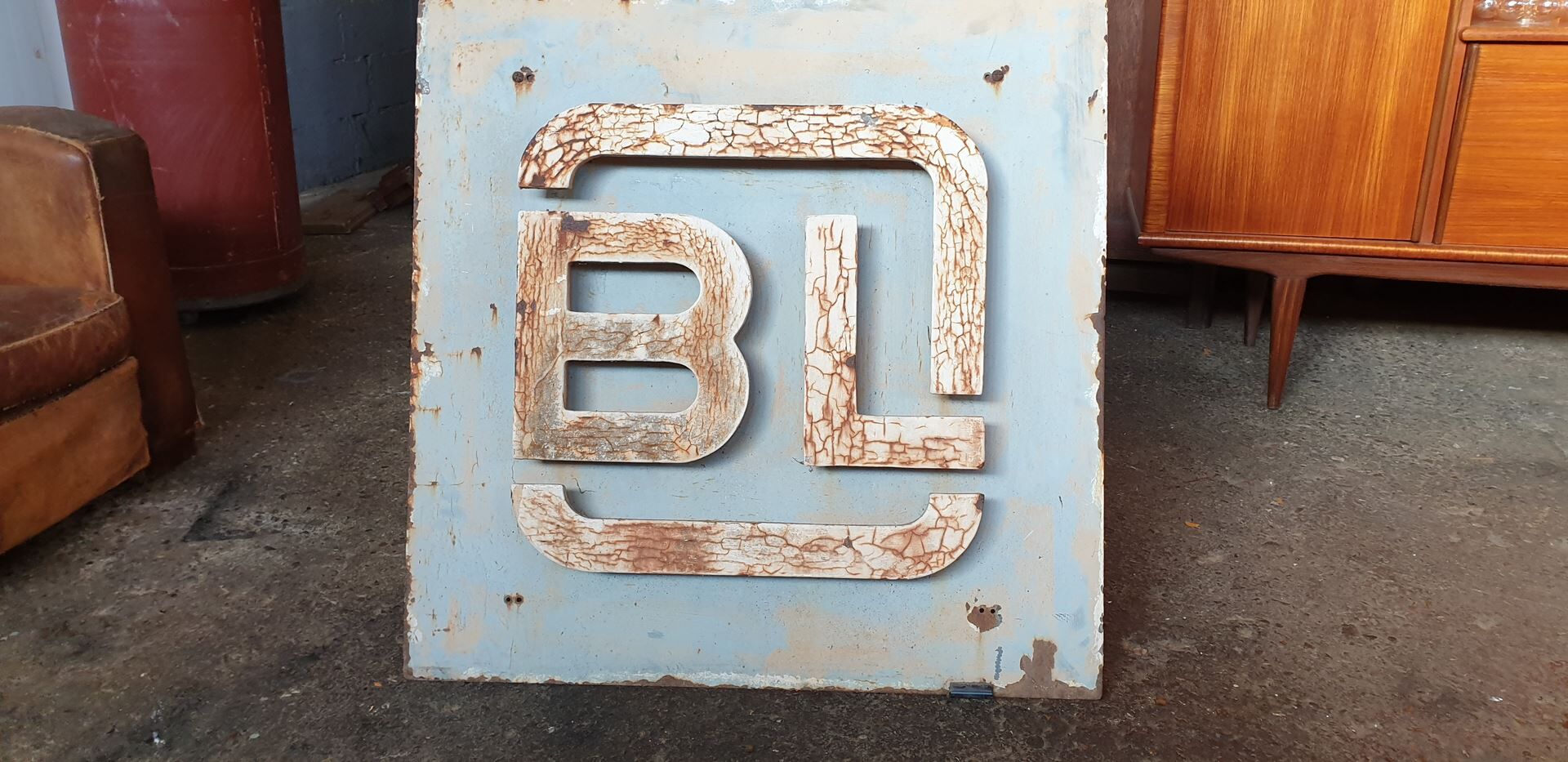 Old metal factory sign