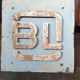Old metal factory sign