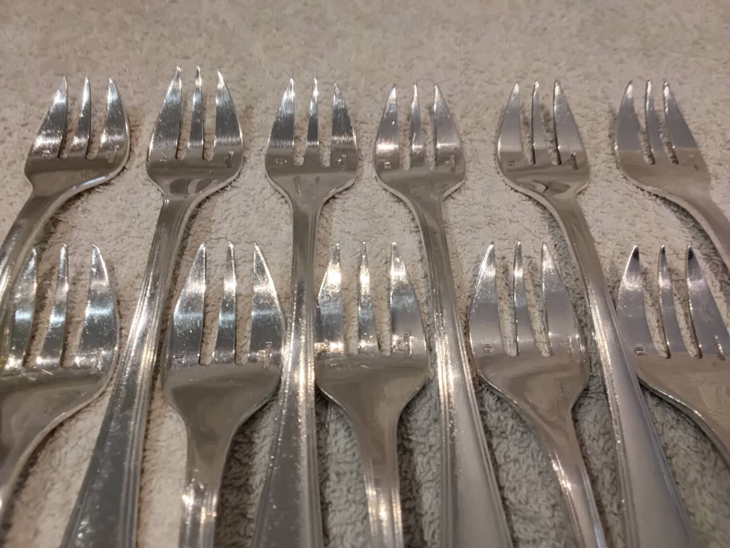 12 silver-plated oyster forks by Christofle America