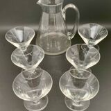 Glass and carafe set with chiseled flower motif