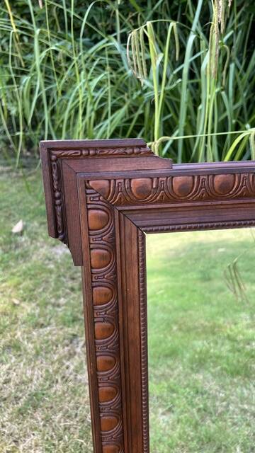 Antique carved wooden mirror