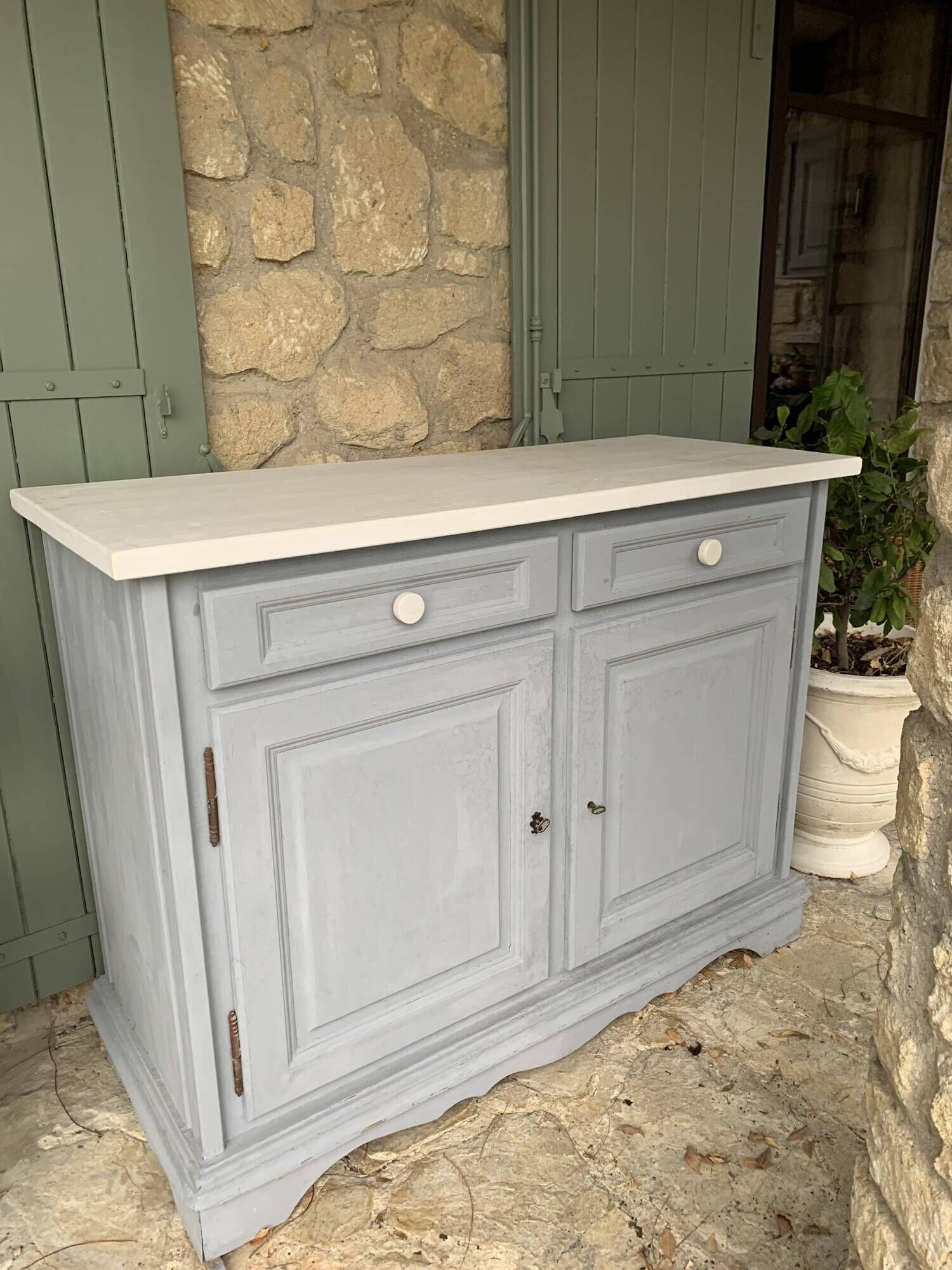 Robust country sideboard with country charm with marble handles in gray and white chalk