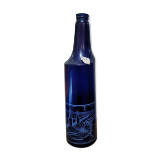 Bouteille en verre bleue surréaliste dessinée par Salvador Dali