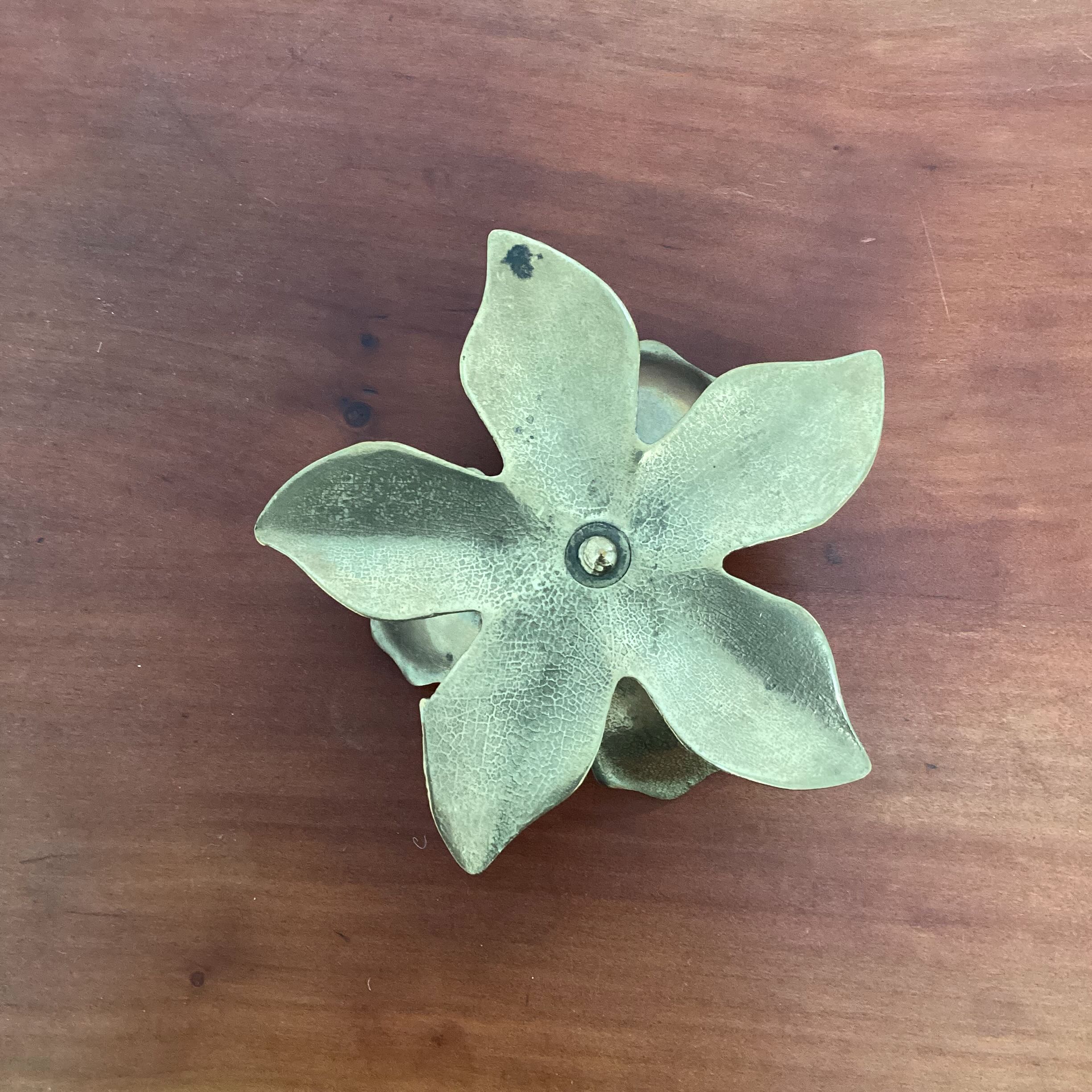 Brass flower candle holder