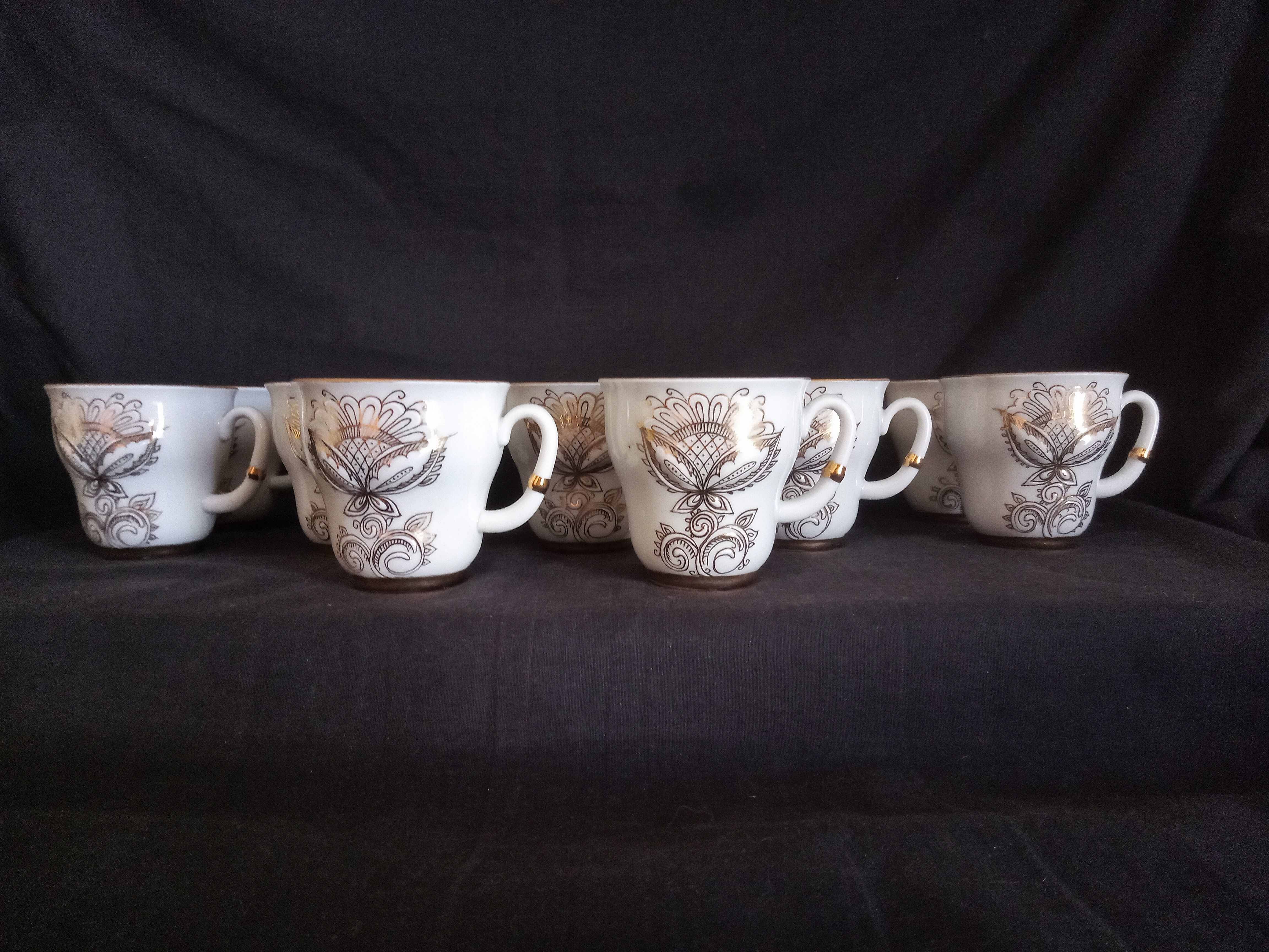 Lomonosov 29-piece porcelain coffee set, cast patterns enhanced with 24k gold