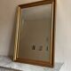 Miroir cadre bois doré