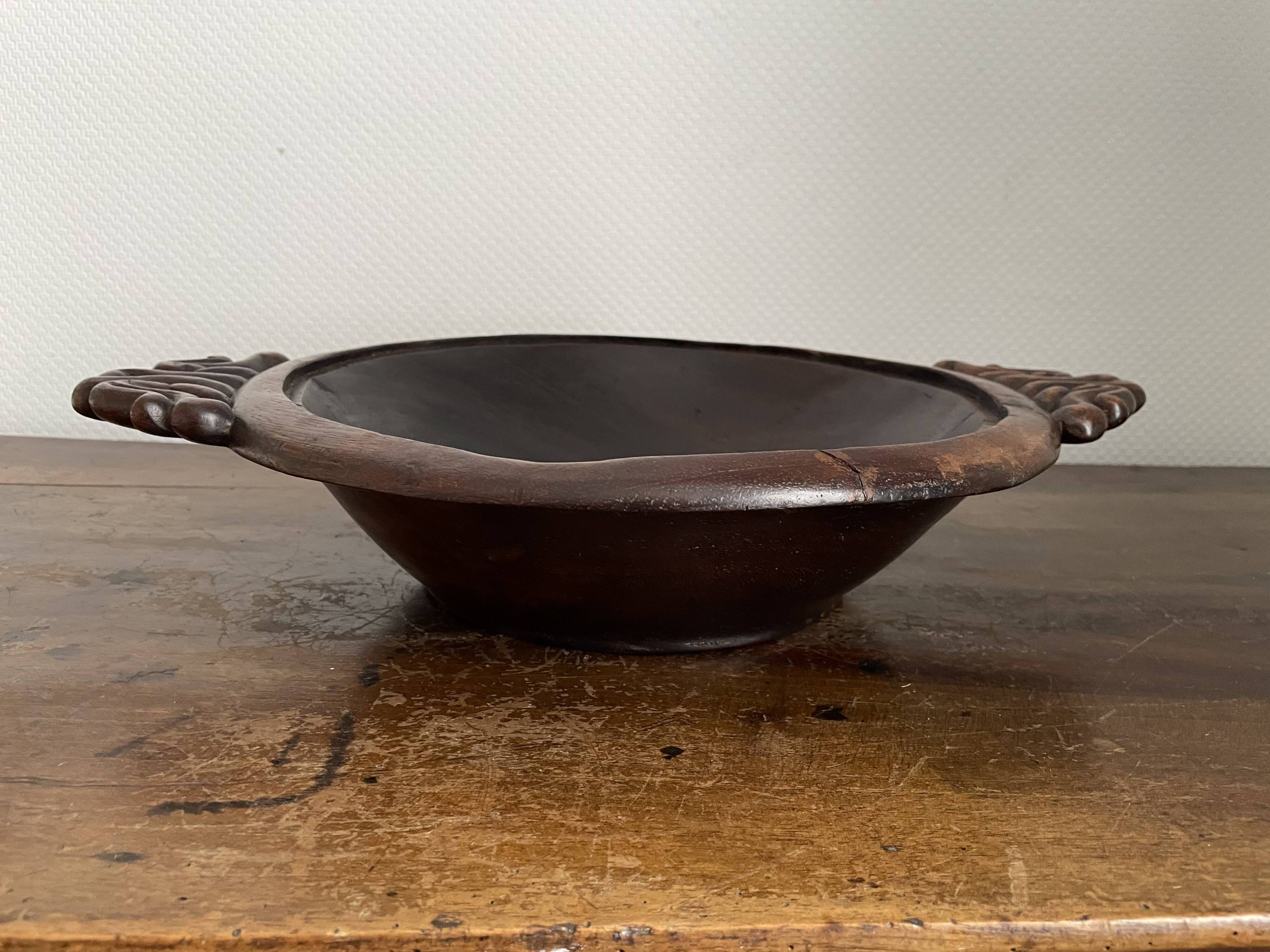 Hollow carved wooden dish