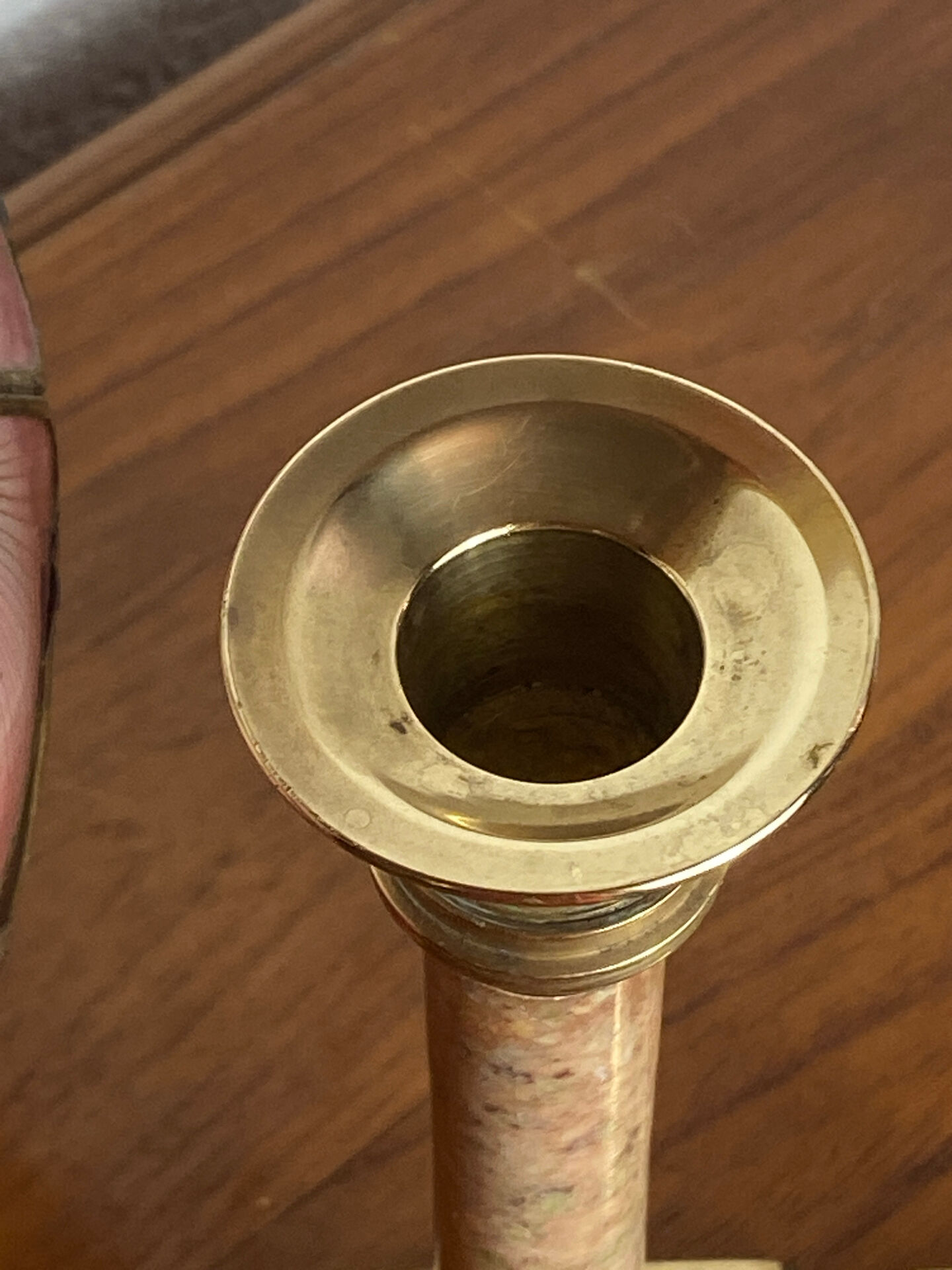 Pair of brass and stone candlesticks