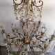 Lustre bronze ancien a pampilles cristal et verre 12 bras 18 lampes