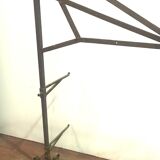 Big in front of hammered iron fireplace