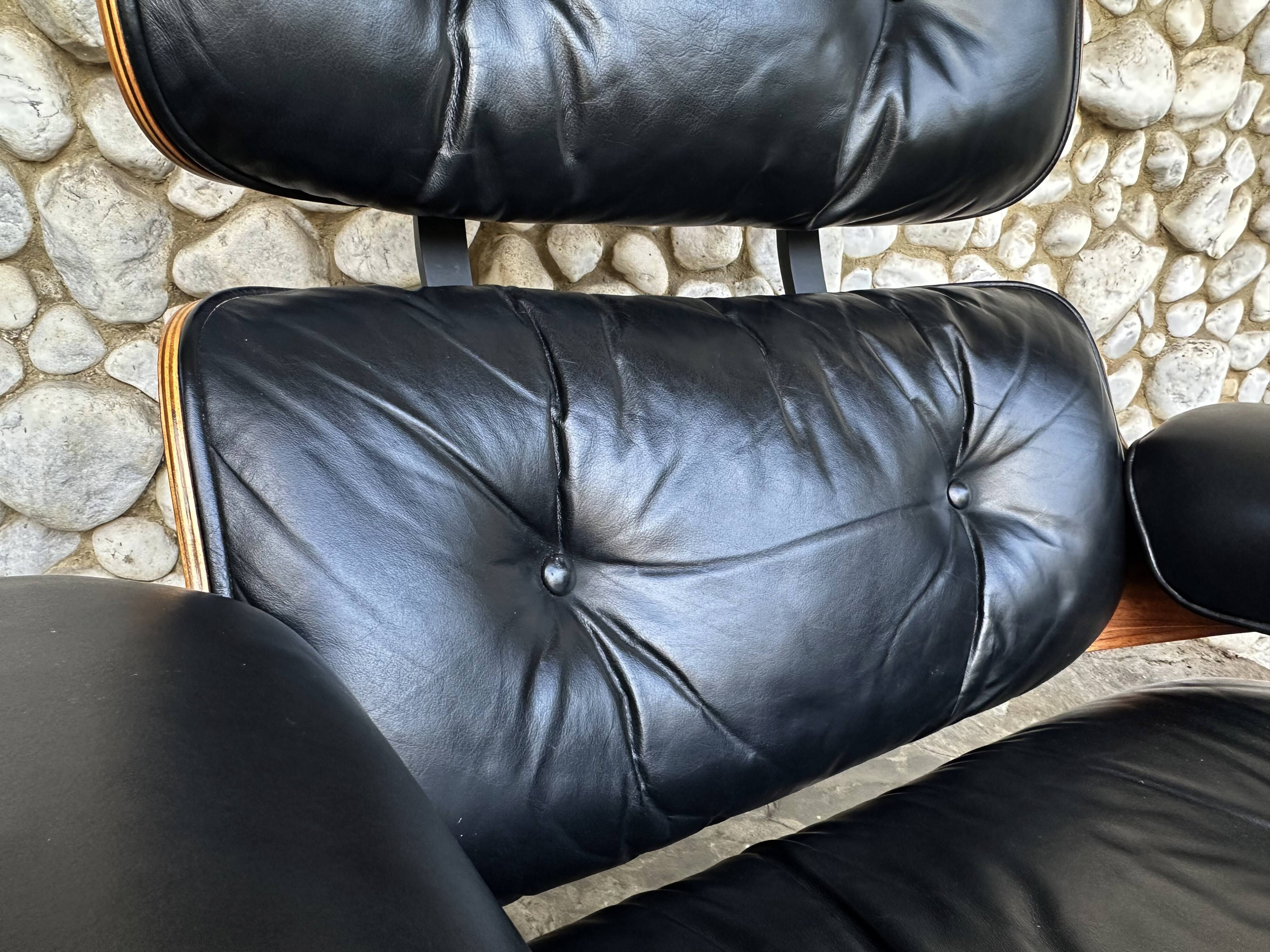 Fauteuil Lounge et ottoman Herman Miller Charles & Ray Eames, palissandre