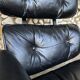 Fauteuil Lounge et ottoman Herman Miller Charles & Ray Eames, palissandre