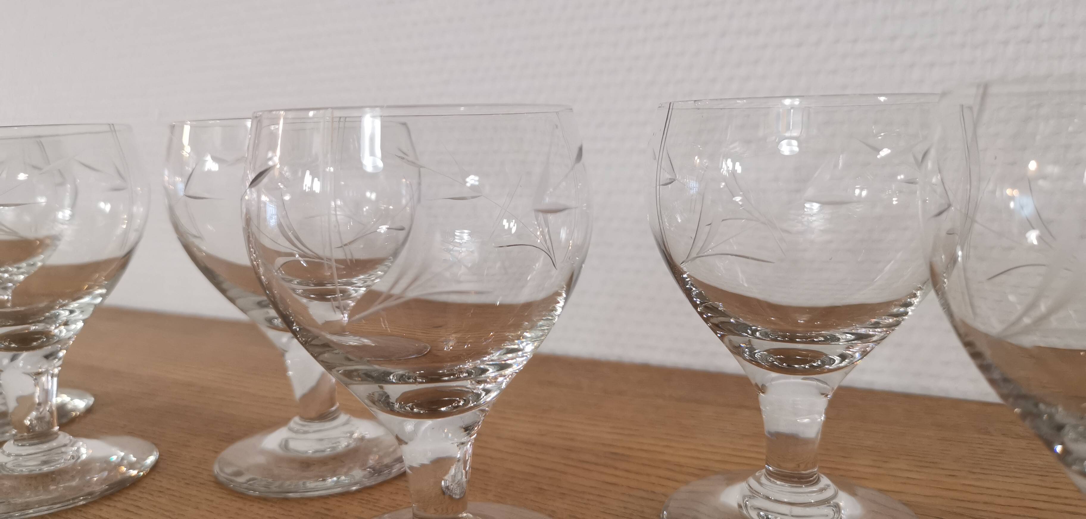 Set of 7 finely engraved vintage wine glasses