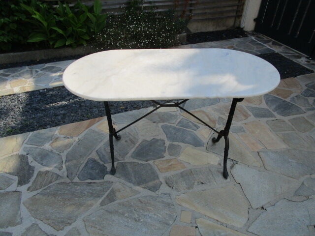 Antique marble bistro table and cast iron foot
