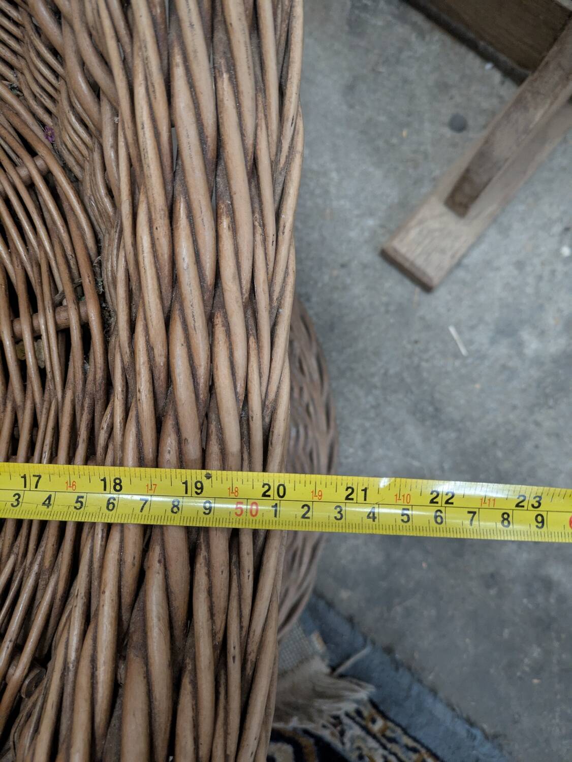 Large woven rattan armchair