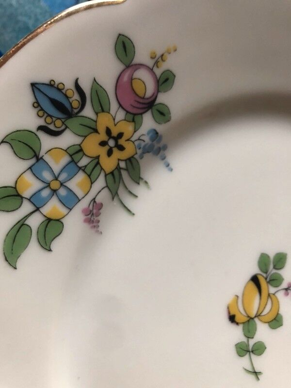 6 flat flowery plates in Limoges porcelain