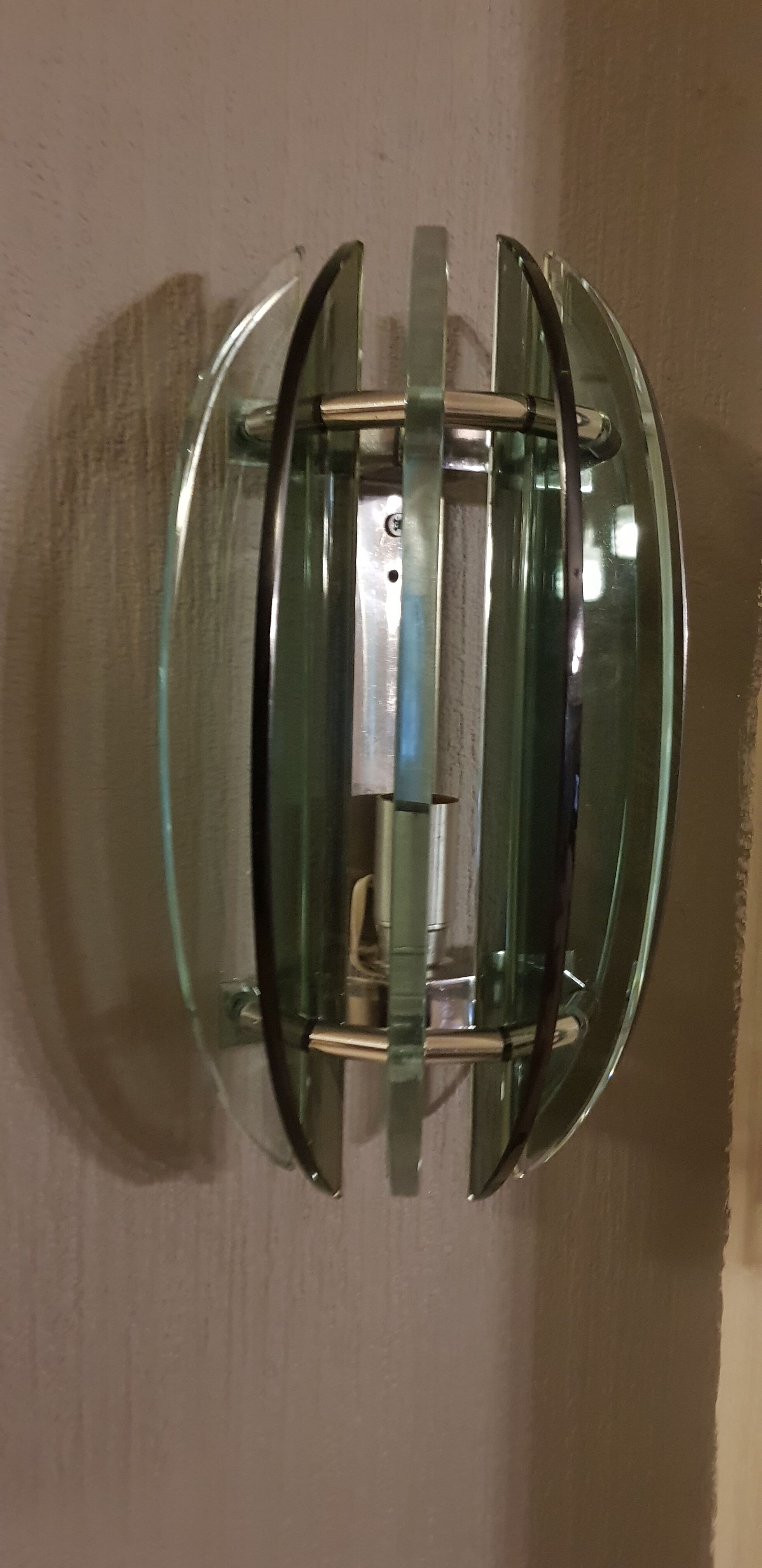 Veca pair of vintage wall light dating from the 1960s.