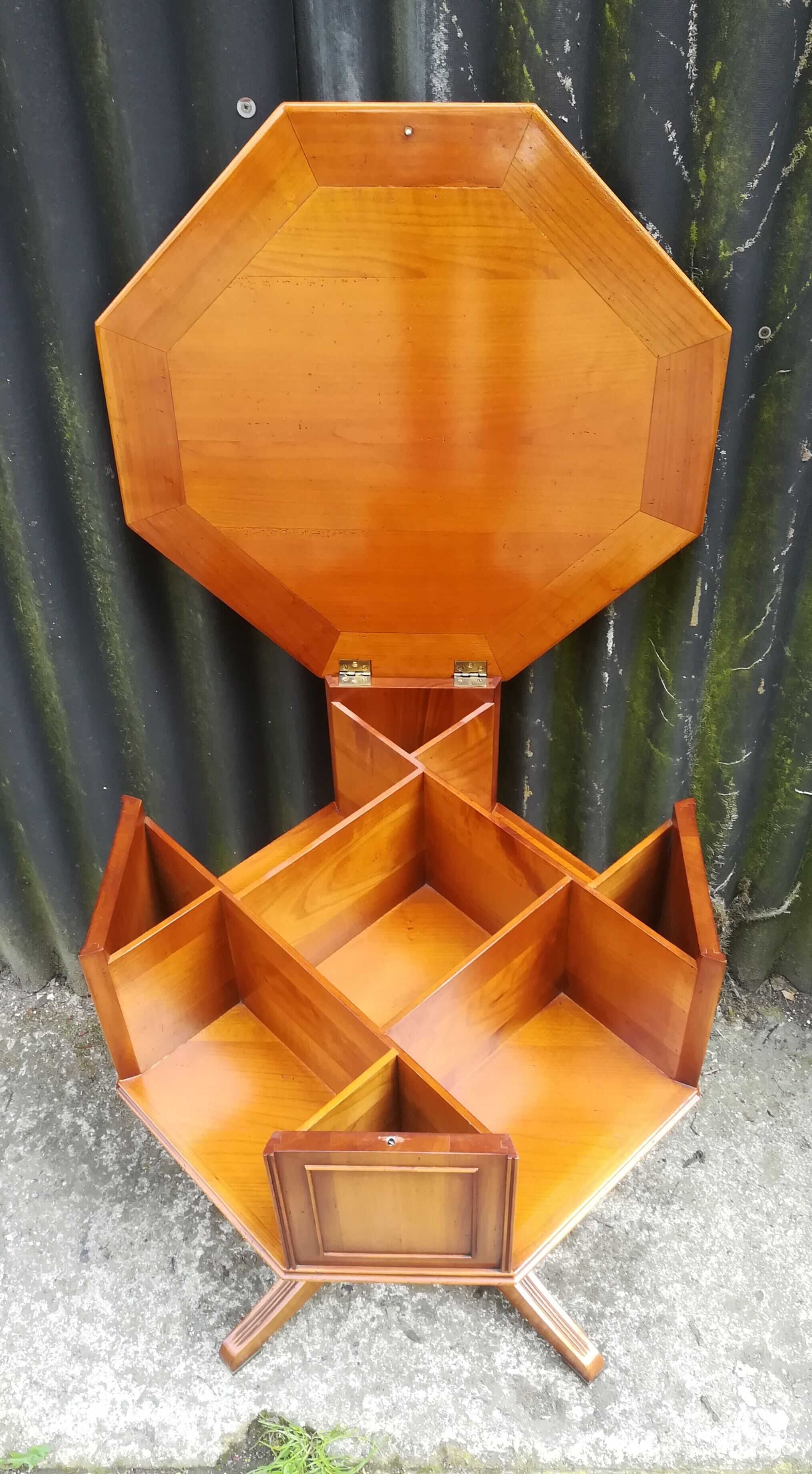 Storage cabinet revolving in cherry