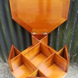 Storage cabinet revolving in cherry