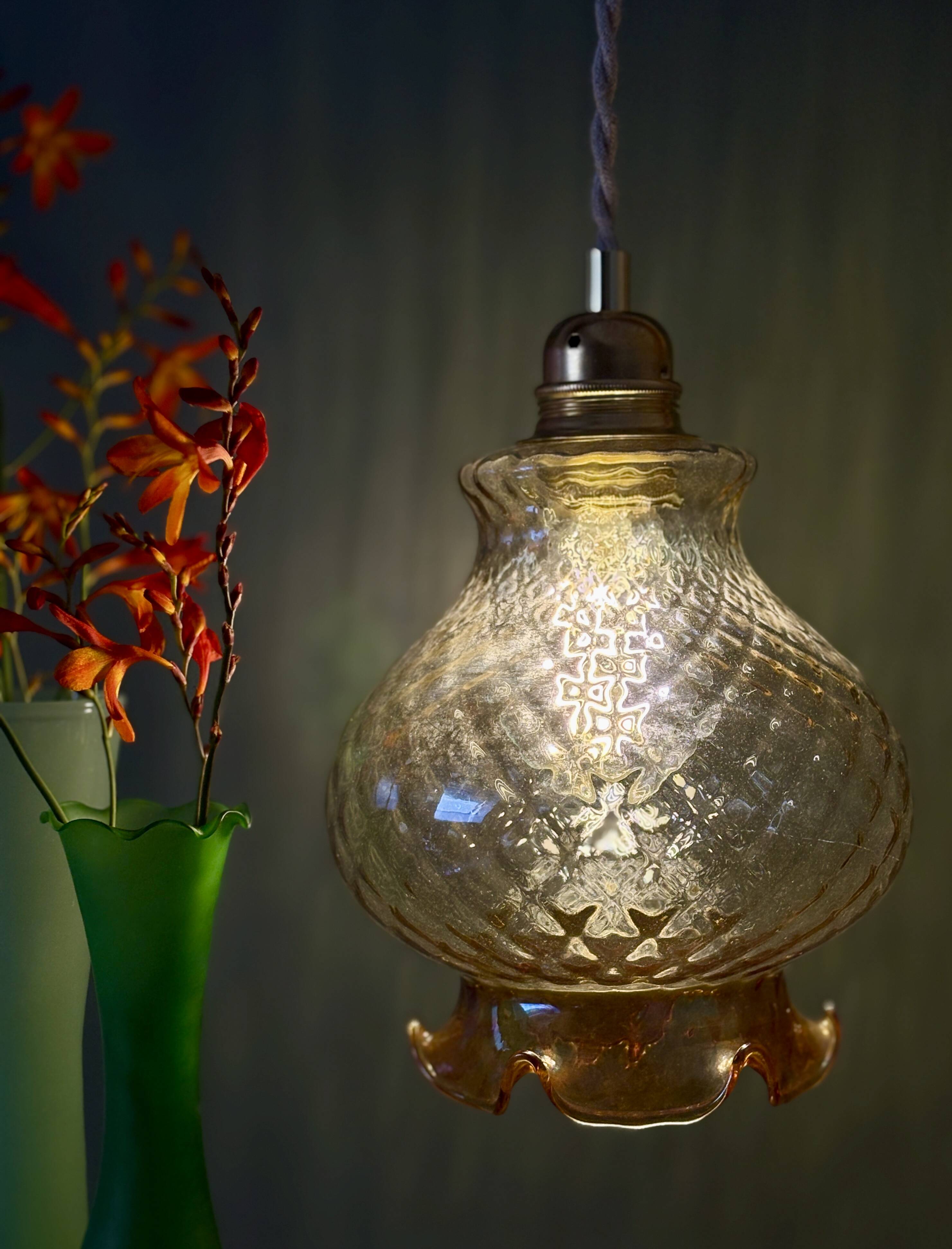 Vintage amber glass suspension globe