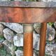 Empire style mahogany and mahogany veneer tripod pedestal table