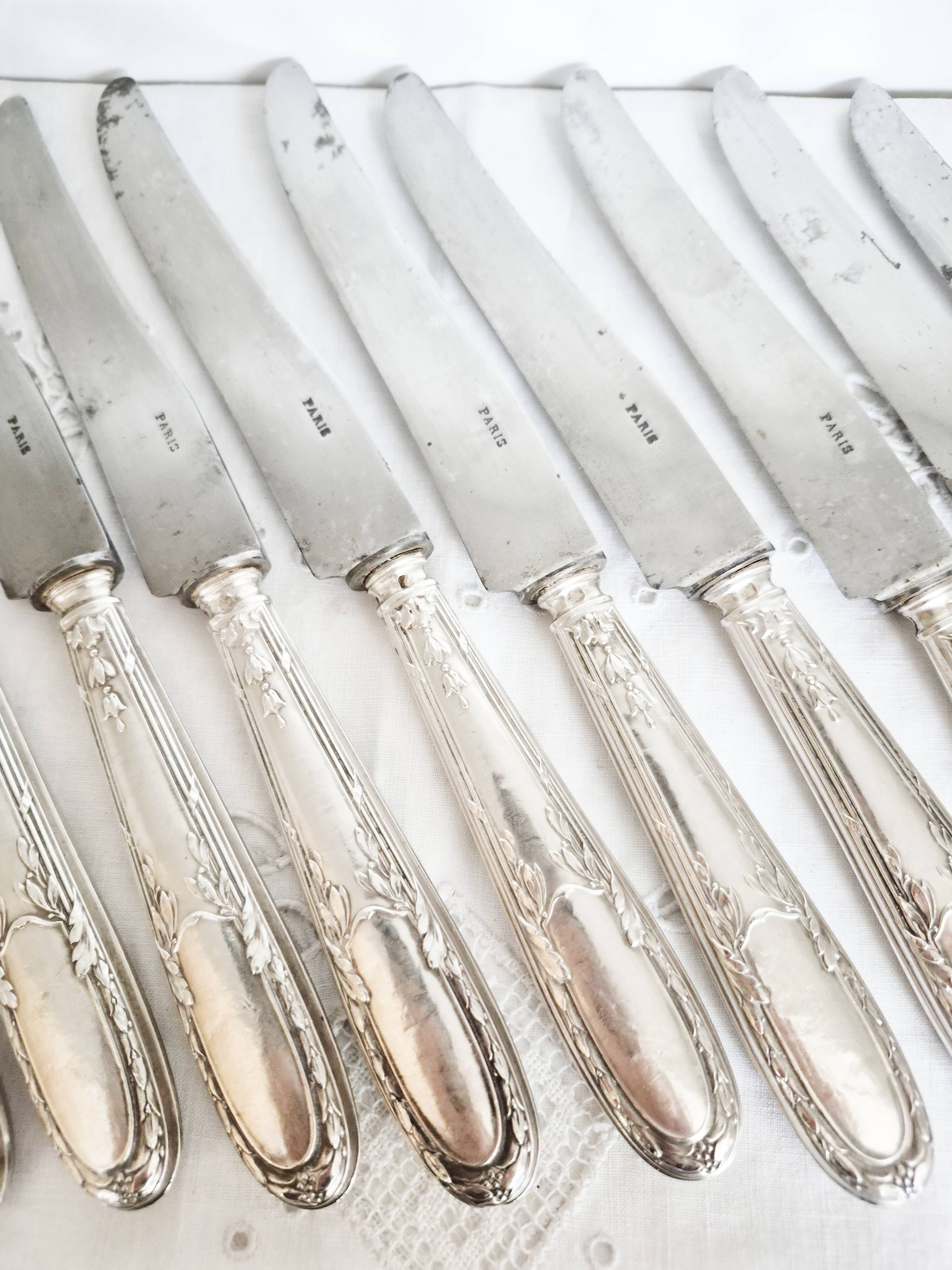 Set of 11 vintage knives, steel blades and silver handles