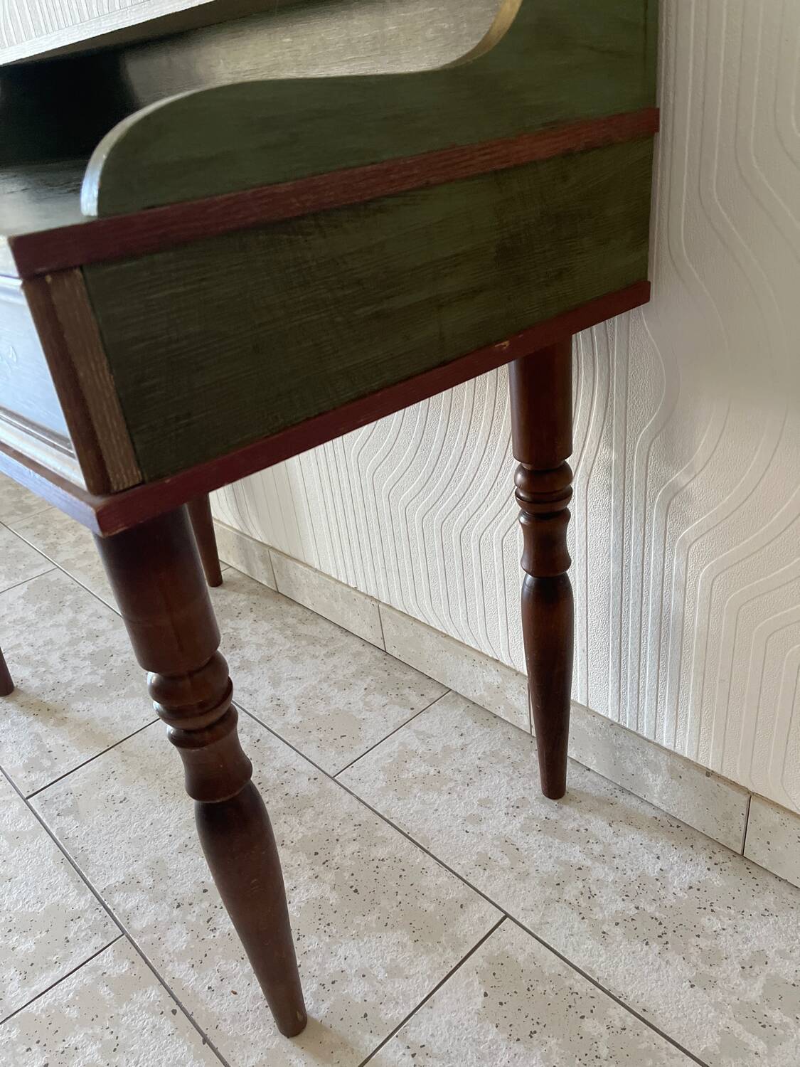 Wooden dressing table with olive green chair and floral patterns
