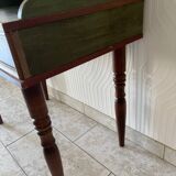 Wooden dressing table with olive green chair and floral patterns
