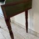 Wooden dressing table with olive green chair and floral patterns