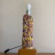 Openwork ceramic lamp base with Garden of Eden decor
