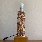 Openwork ceramic lamp base with Garden of Eden decor