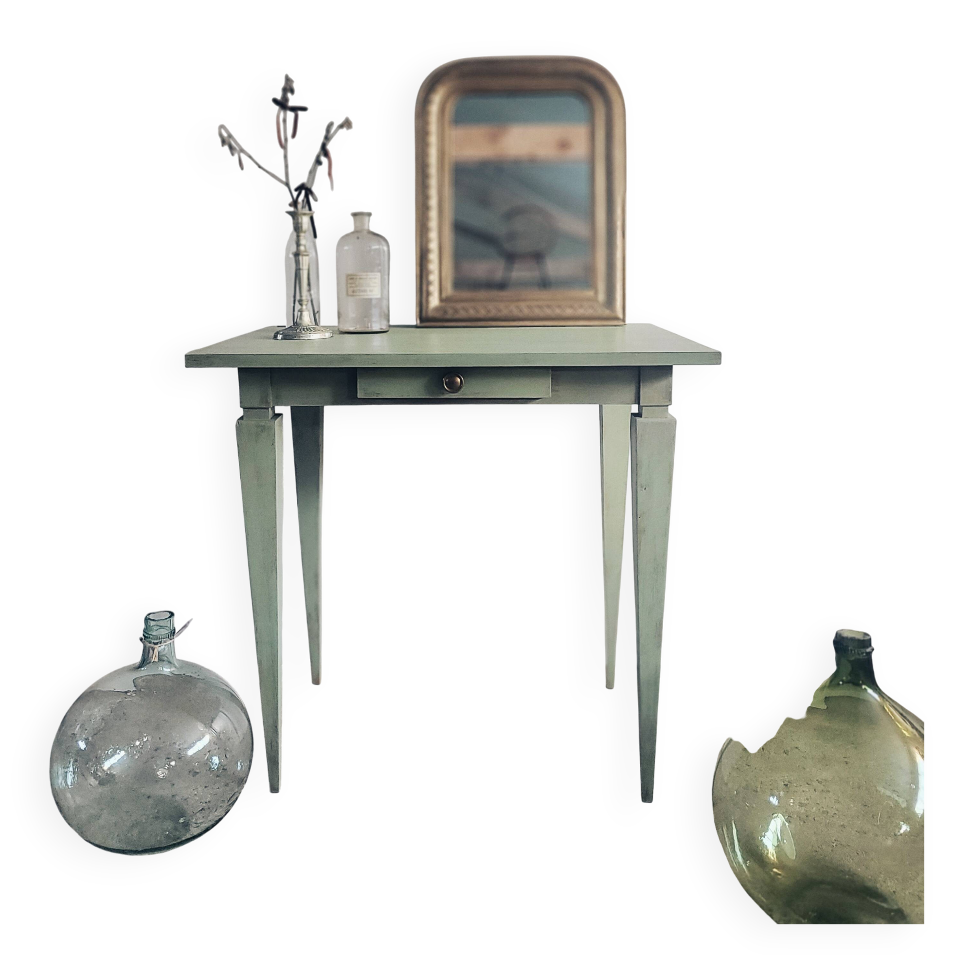 Green side table with tapered legs