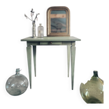 Green side table with tapered legs