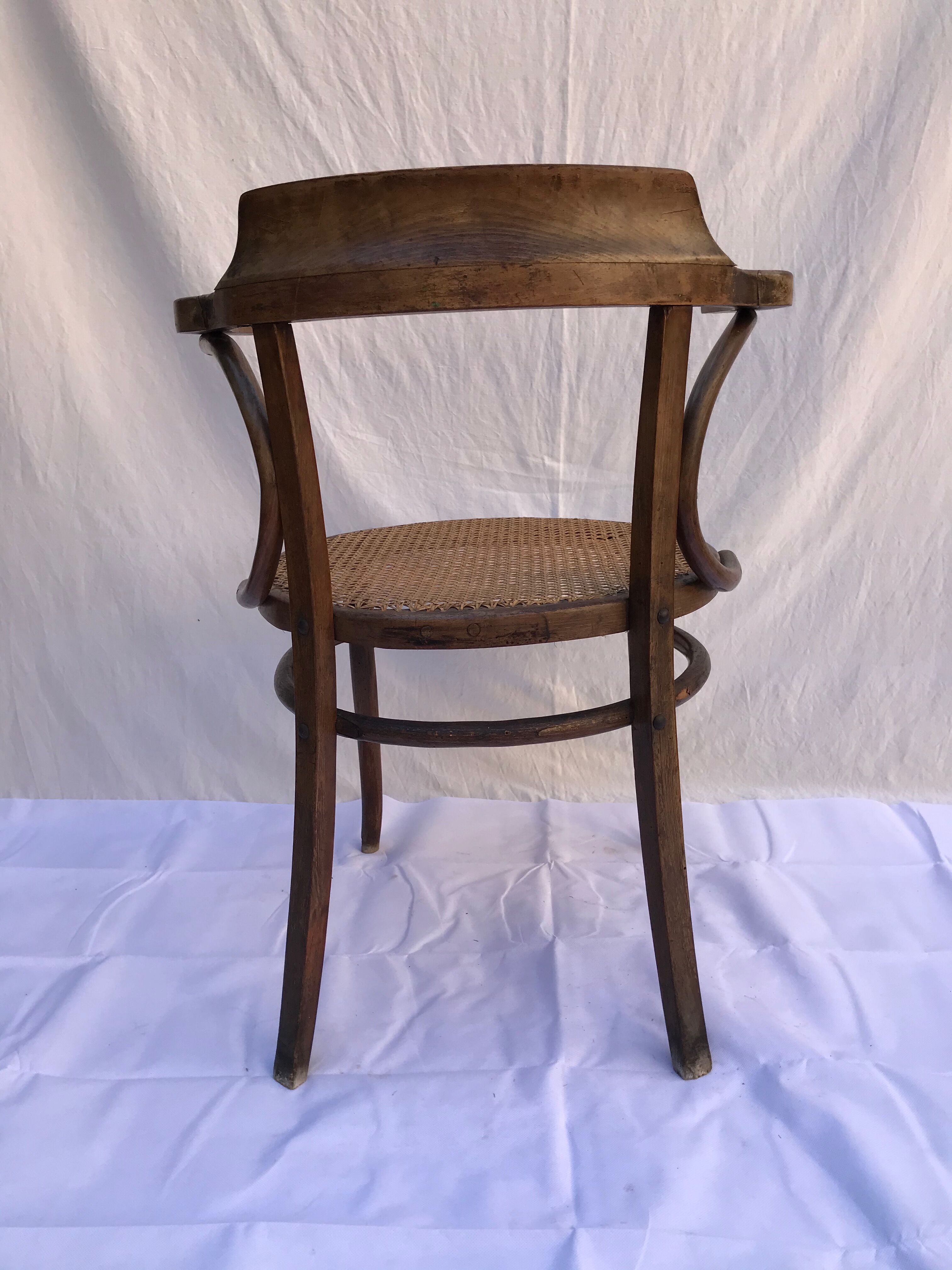 Former Baumann canne armchair