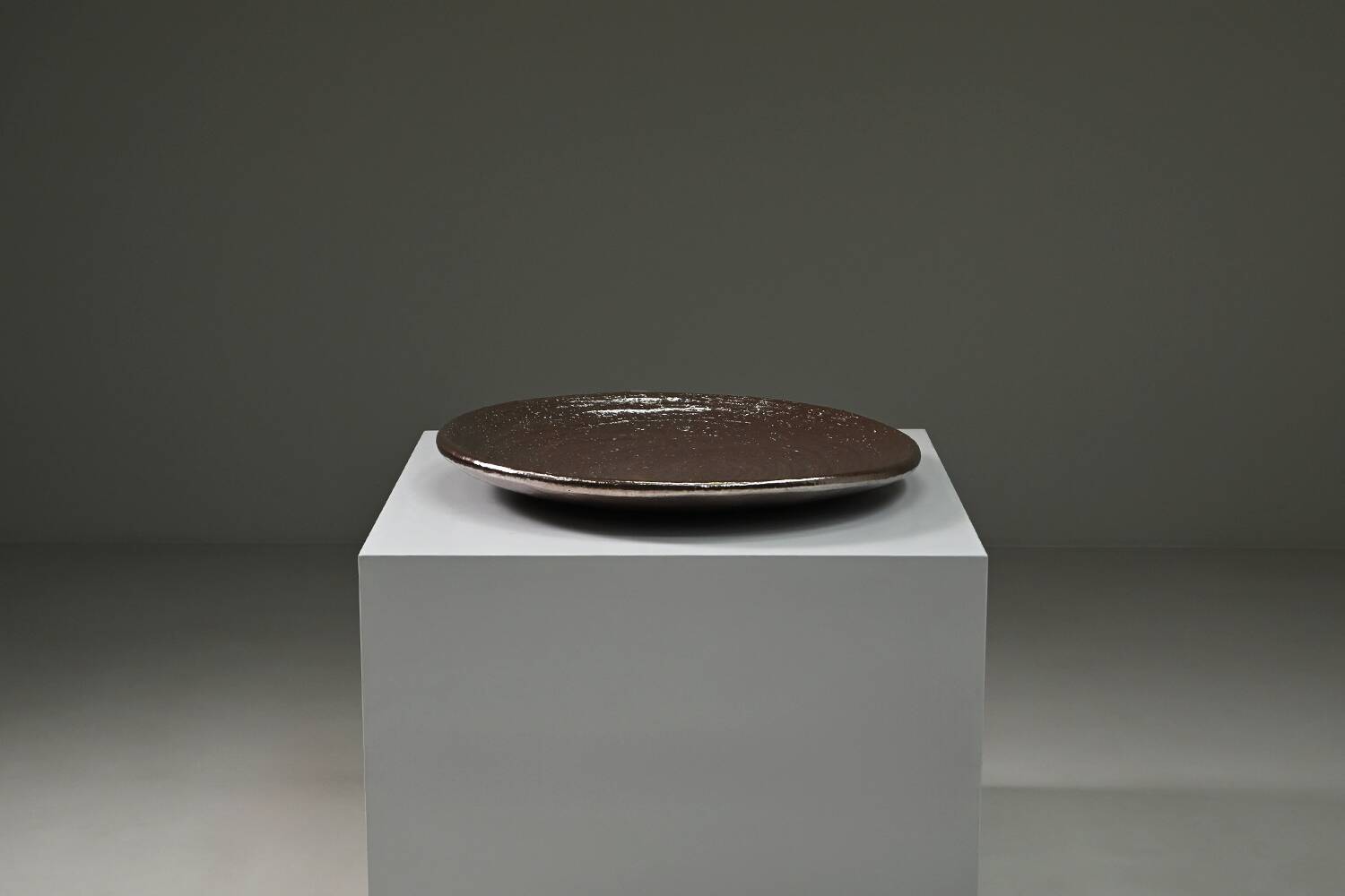 Large handmade metallic glazed ceramic bowl, circa 1980s–1990s.