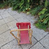 Old rattan doll stroller