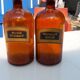 Paire de flacons a pharmacie en verre marron