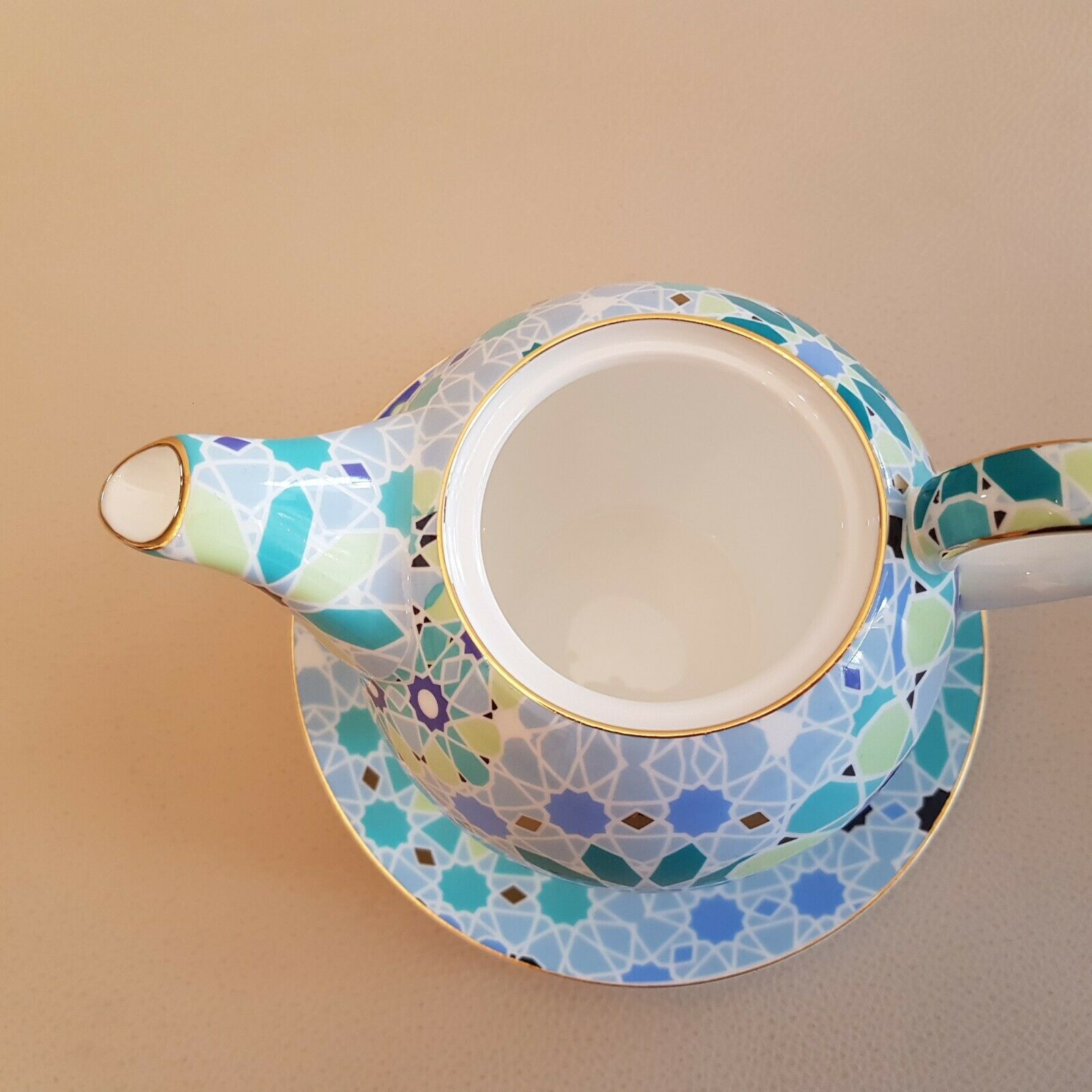 Teapot geometric decoration blue golden green