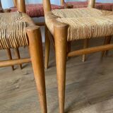 6 large straw chairs by Genevieve Pons