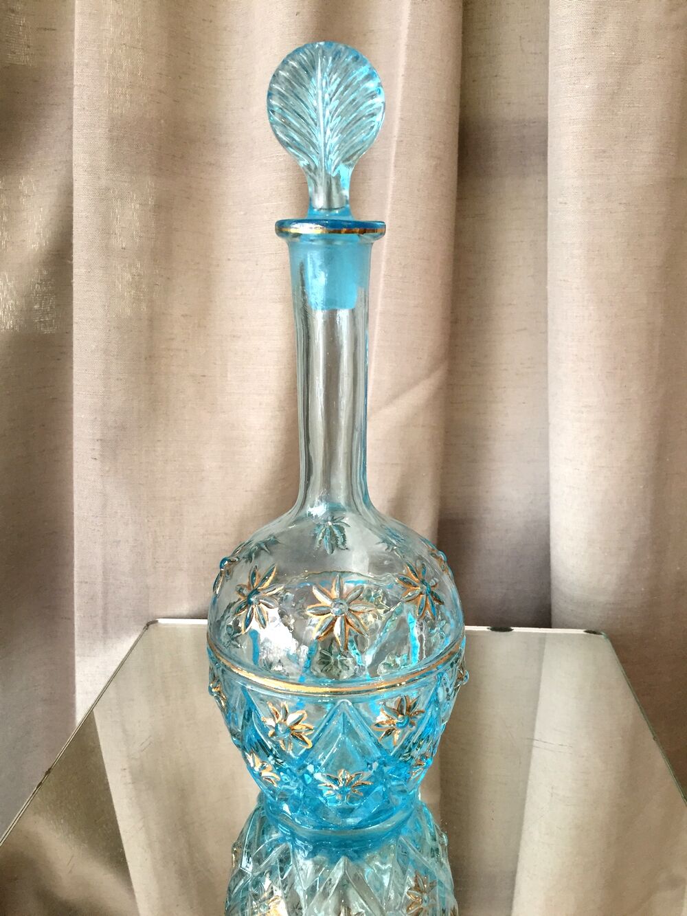 Turquoise blue liquor decanter and glass gild mold press of the 1950s