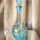 Turquoise blue liquor decanter and glass gild mold press of the 1950s