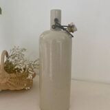 Old enameled stoneware bottle