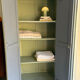Antique Parisian wardrobe in sage green patina