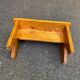 Small rectangular farmhouse stool in solid oak from the 1960s for children.