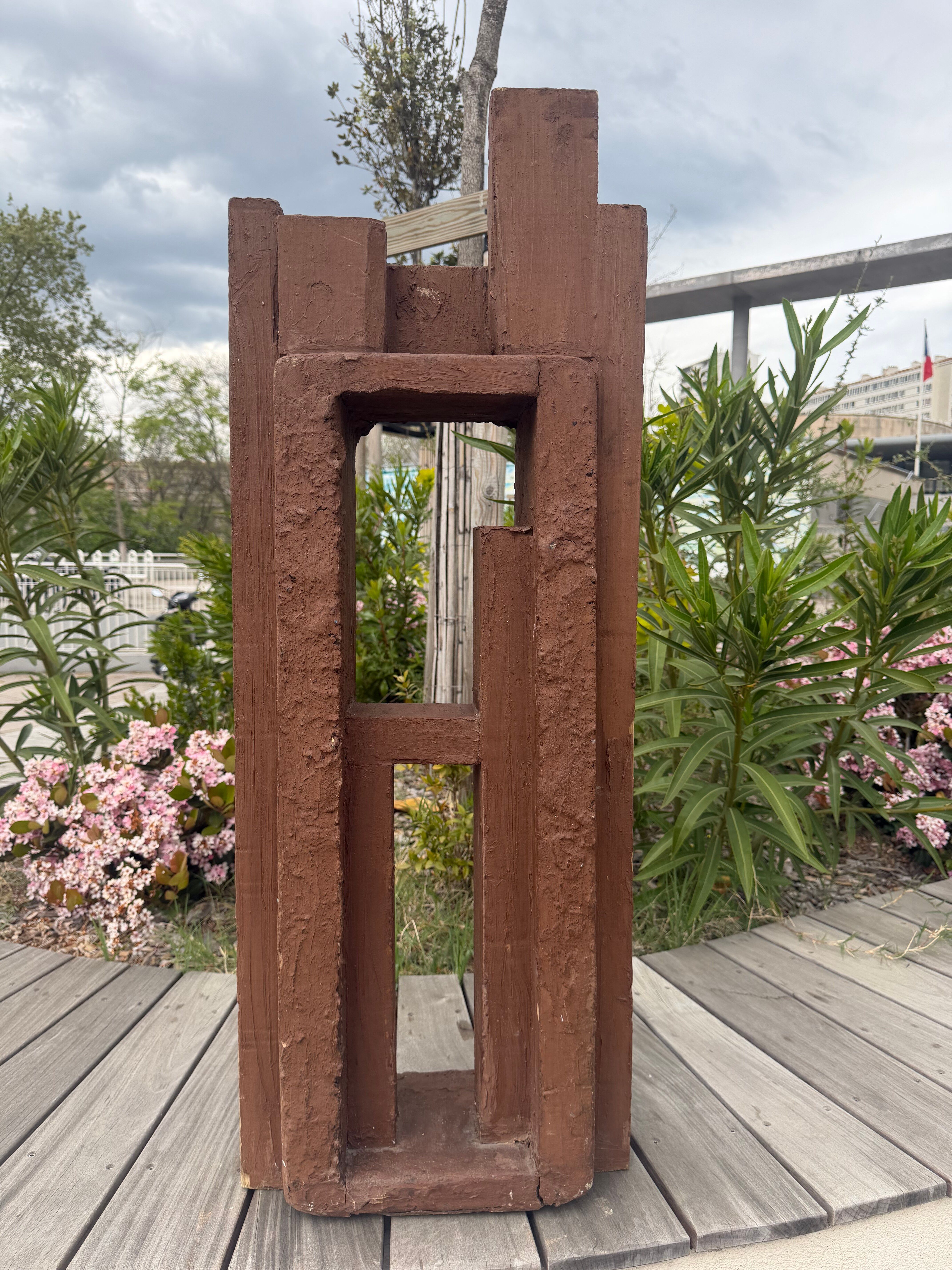 Superb postmodern brutalist sculpture in wood, metal, and material.