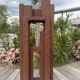 Superb postmodern brutalist sculpture in wood, metal, and material.