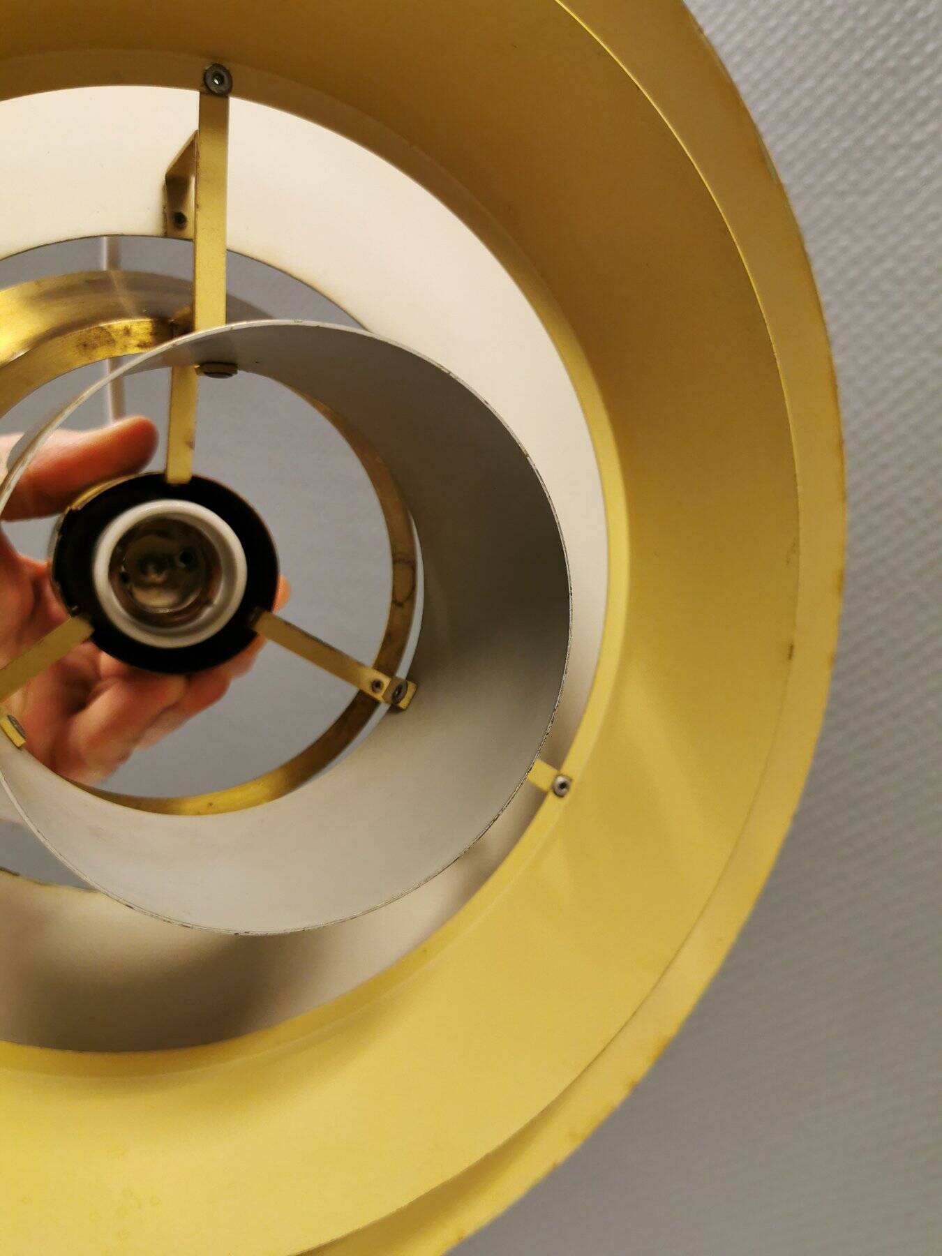 A mid-century Danish hanging lamp in solid brass by Jo Hammerborg for Fog & Mørup.